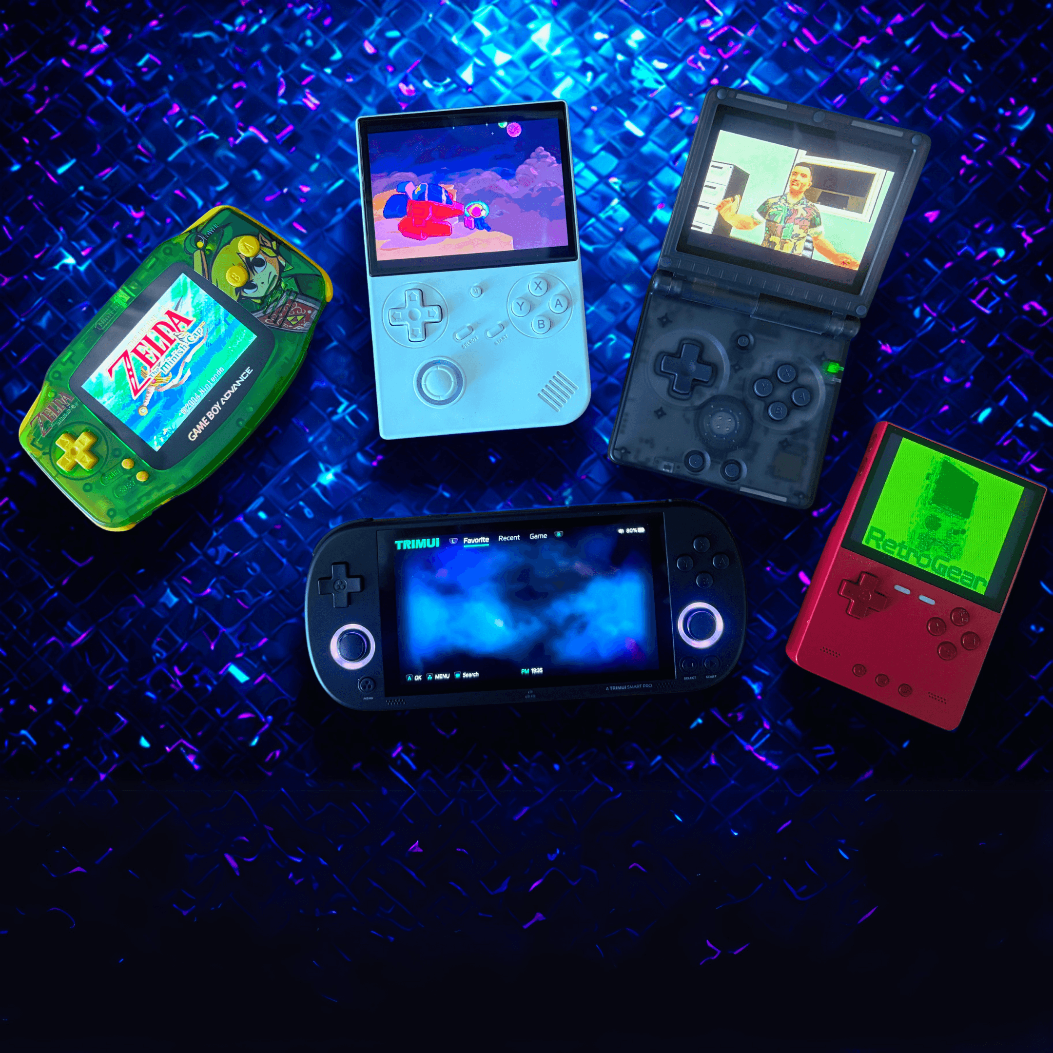 Five different portable game consoles on a blue background, including a Game Boy Advance, modern handhelds and a TrimUI Brick.